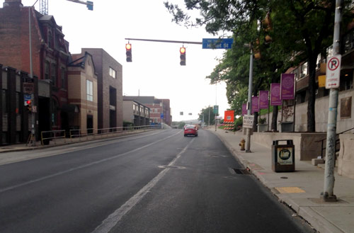 A freshly paved section of Fifth Avenue in 2015 has had no added sharrows, bike lanes or new signs to help make it a safer route.